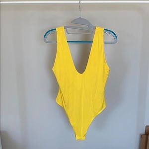 By the way. Joy high cut bodysuit yellow. Medium